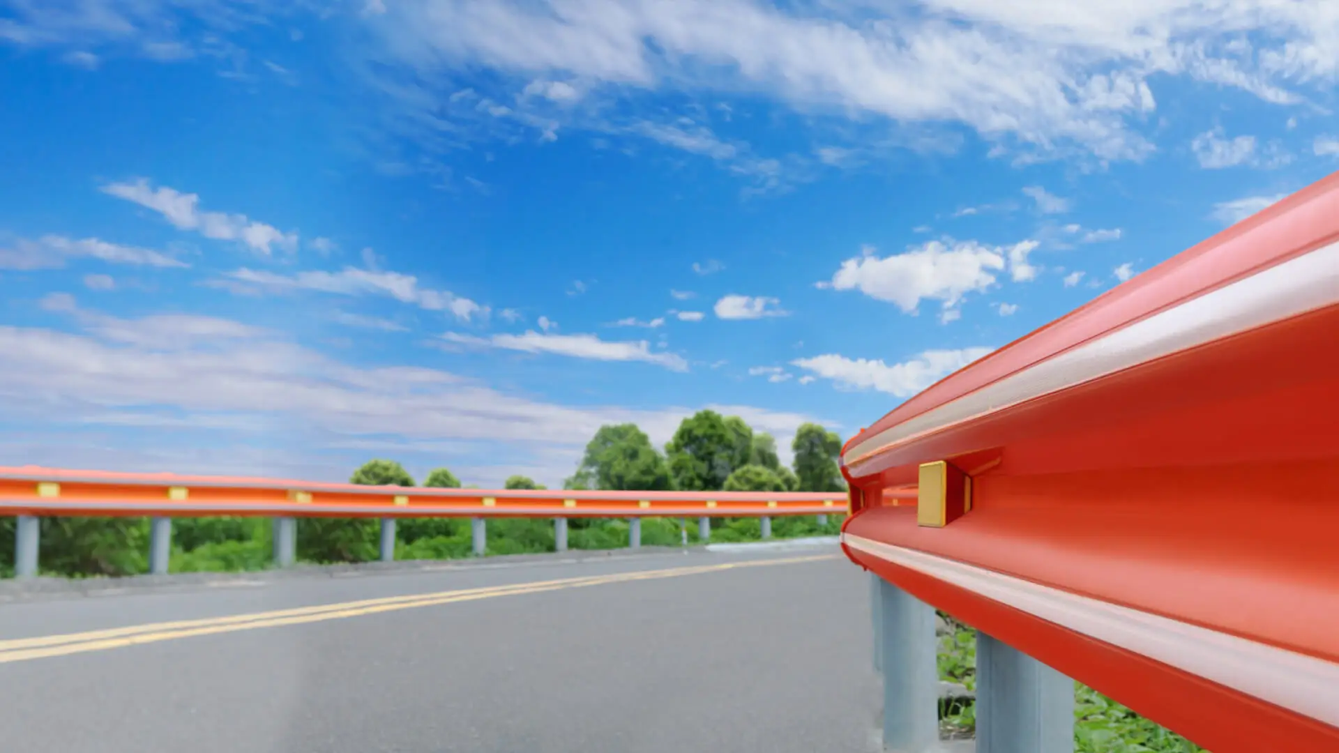 ASP Ultra Tough polycarbonate highway guardrail installed along a paved road with yellow reflector, produced by AMP in Taiwan
