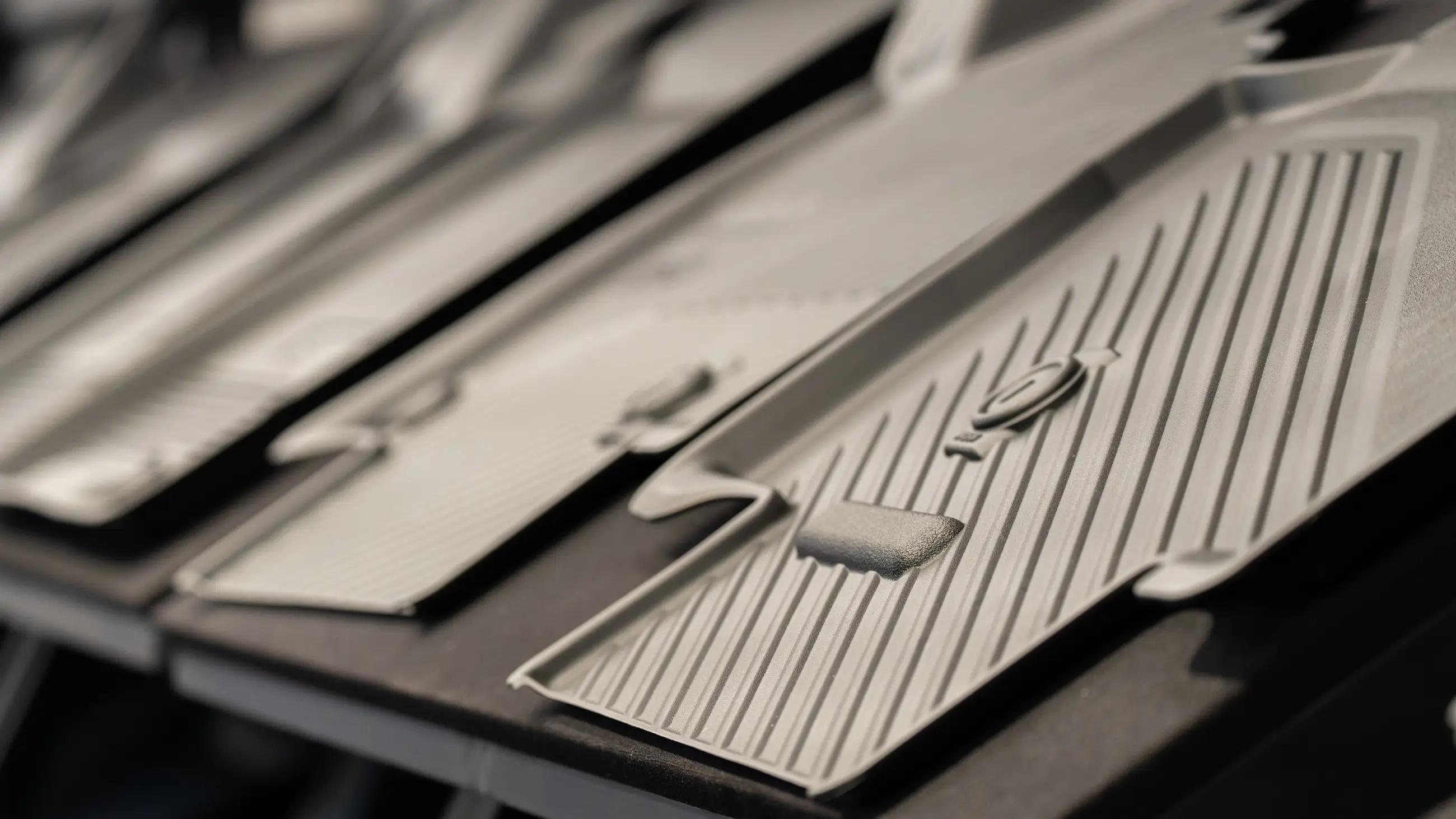 Injection-molded automotive plastic component manufactured by AMP