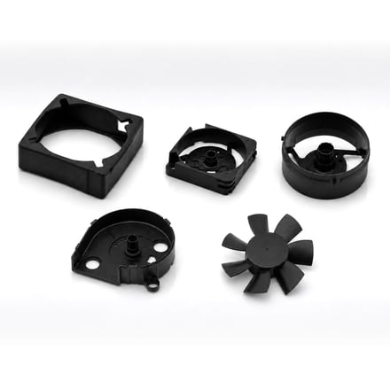AMP injection-molded automotive blower unit housing and fan components, produced and assembled in-house