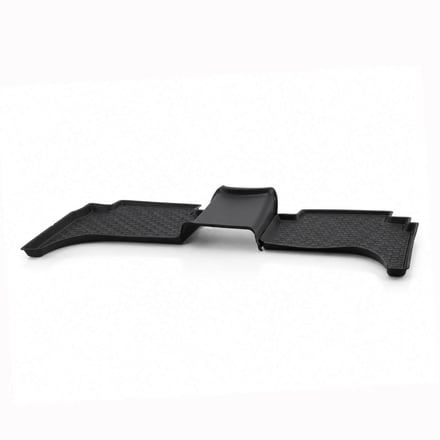 AMP injection-molded all-weather floor mats with textured tread pattern and raised lip profile for automotive OEM programs