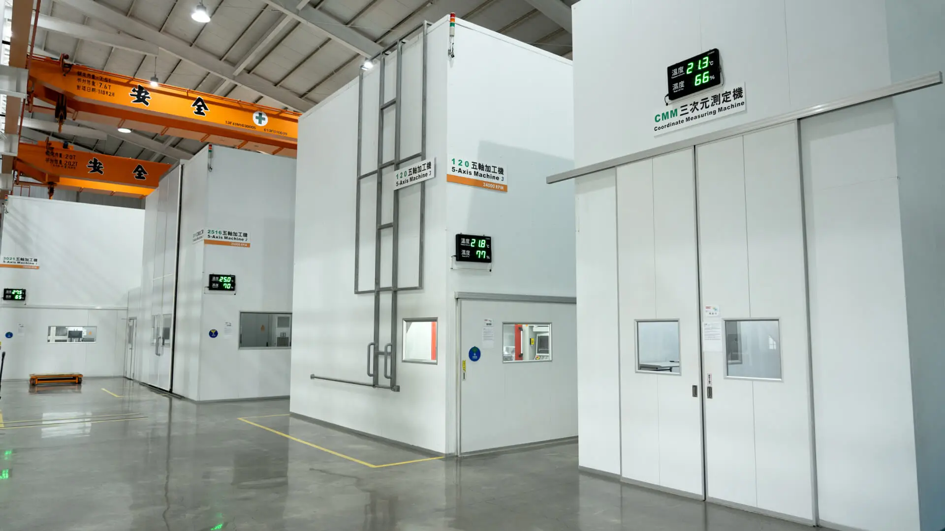 AMP metrology lab with coordinate measuring machine enclosures and environmental monitors at our Taiwan facility