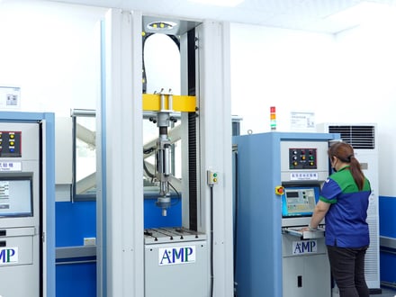 AMP technician monitoring the dynamic fatigue tester that cycles Eco Elephant components for long-term reliability