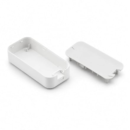 AMP injection-molded small device enclosure in white with snap-fit assembly, produced for electronics OEM applications