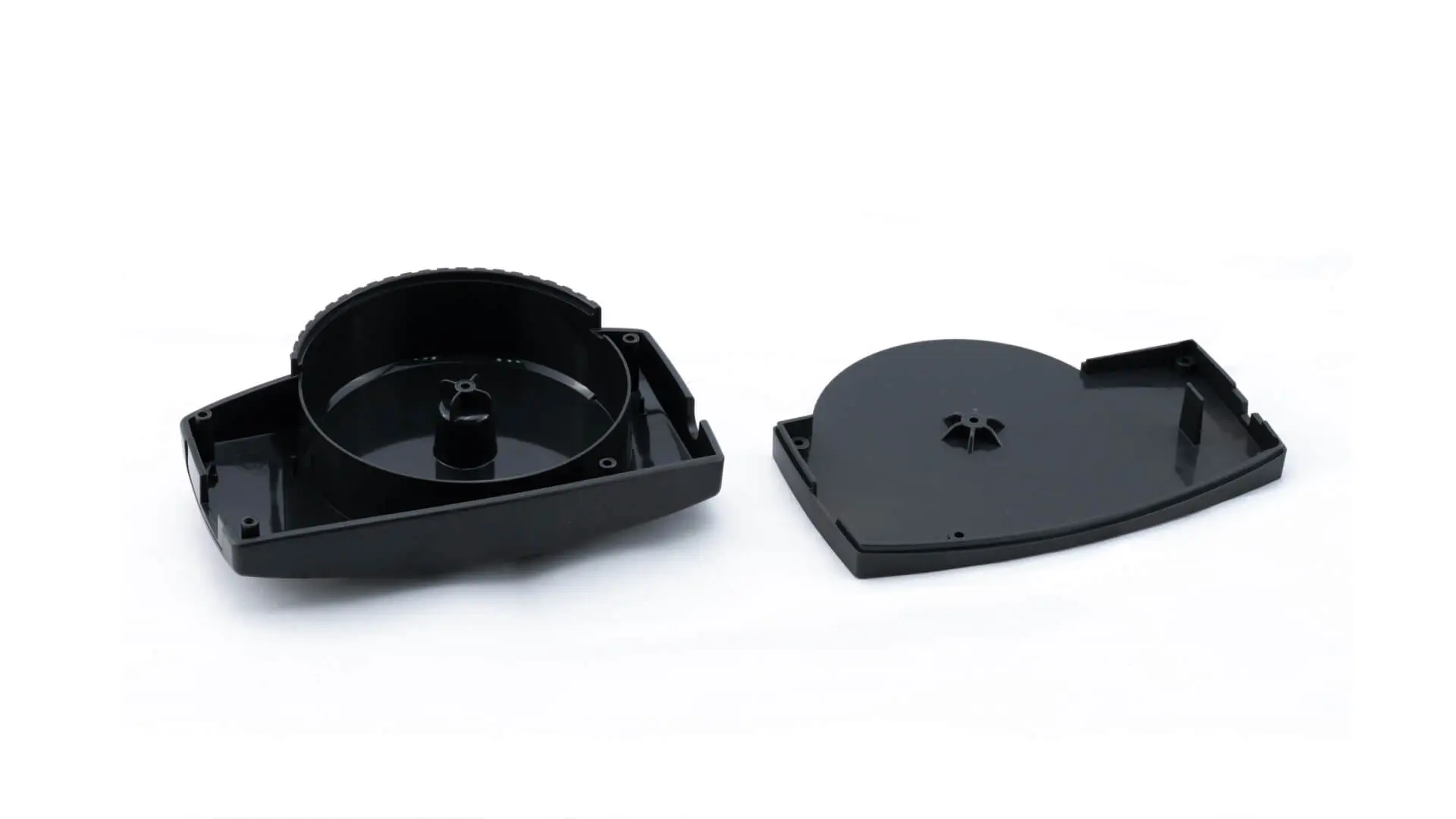 Black injection-molded plastic housing and matching cover with internal ribbing for electronics assemblies, manufactured by AMP