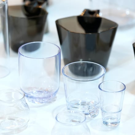 AMP injection-molded coffee brewing components including PP drippers and clear Tritan tumblers for food and beverage OEM programs