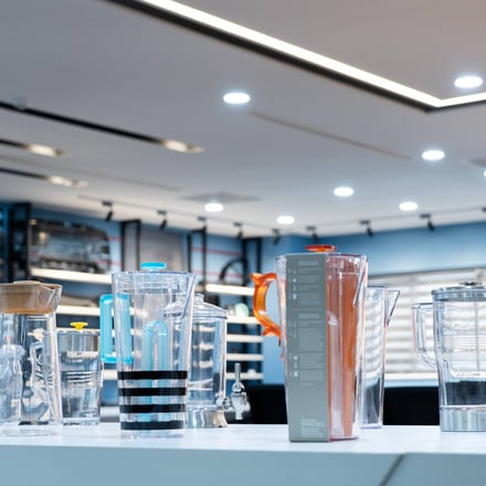 AMP food and beverage product range on display at our showroom, featuring Tritan water bottles, tumblers, and drinkware