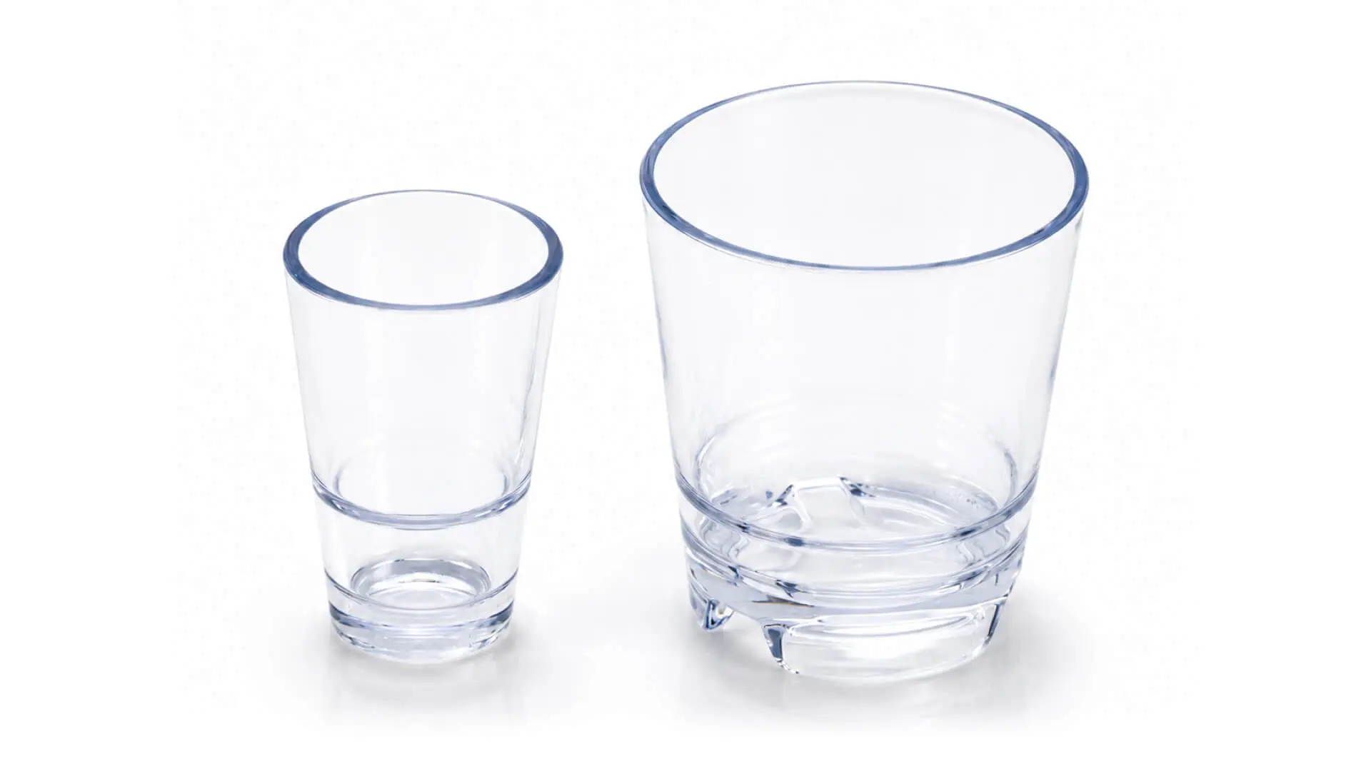 Two clear injection-molded plastic tumblers in different sizes for food and beverage applications, manufactured by AMP