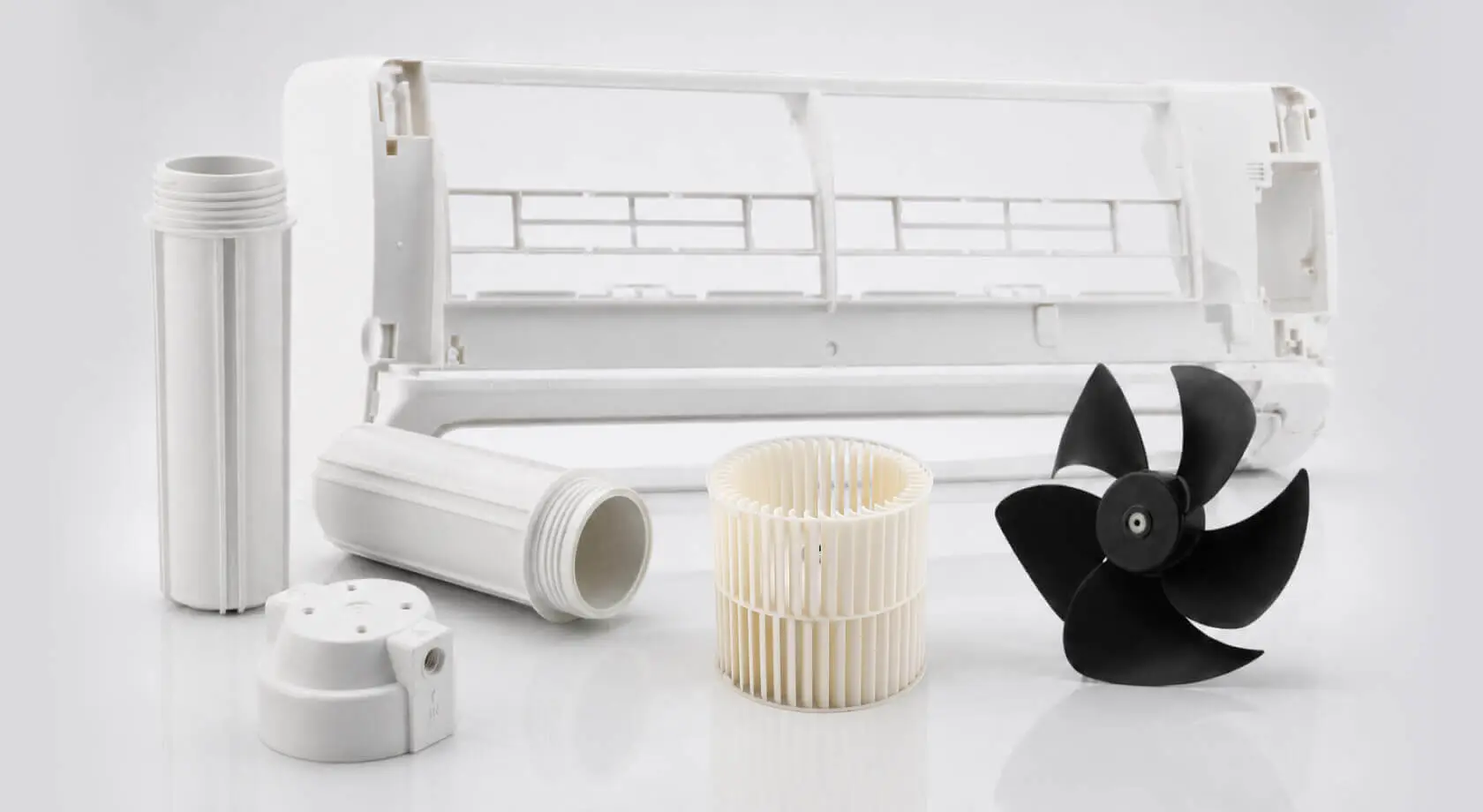 Injection-molded home appliance and HVAC plastic components including an air conditioner housing, blower wheel, axial fan blade, and related parts manufactured by AMP