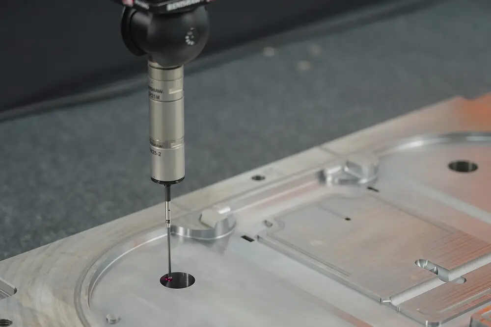 AMP uses Renishaw CMM probing to verify critical dimensions on mold components and first-article parts as part of our IATF 16949 quality control process