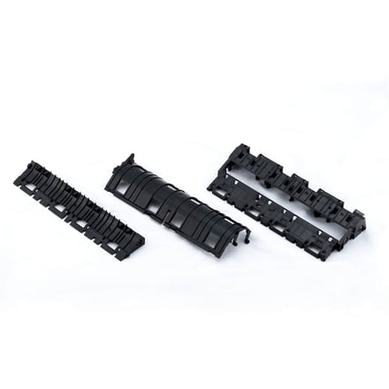 AMP injection-molded printer components with snap-fit assembly features, produced from a multi-cavity mold