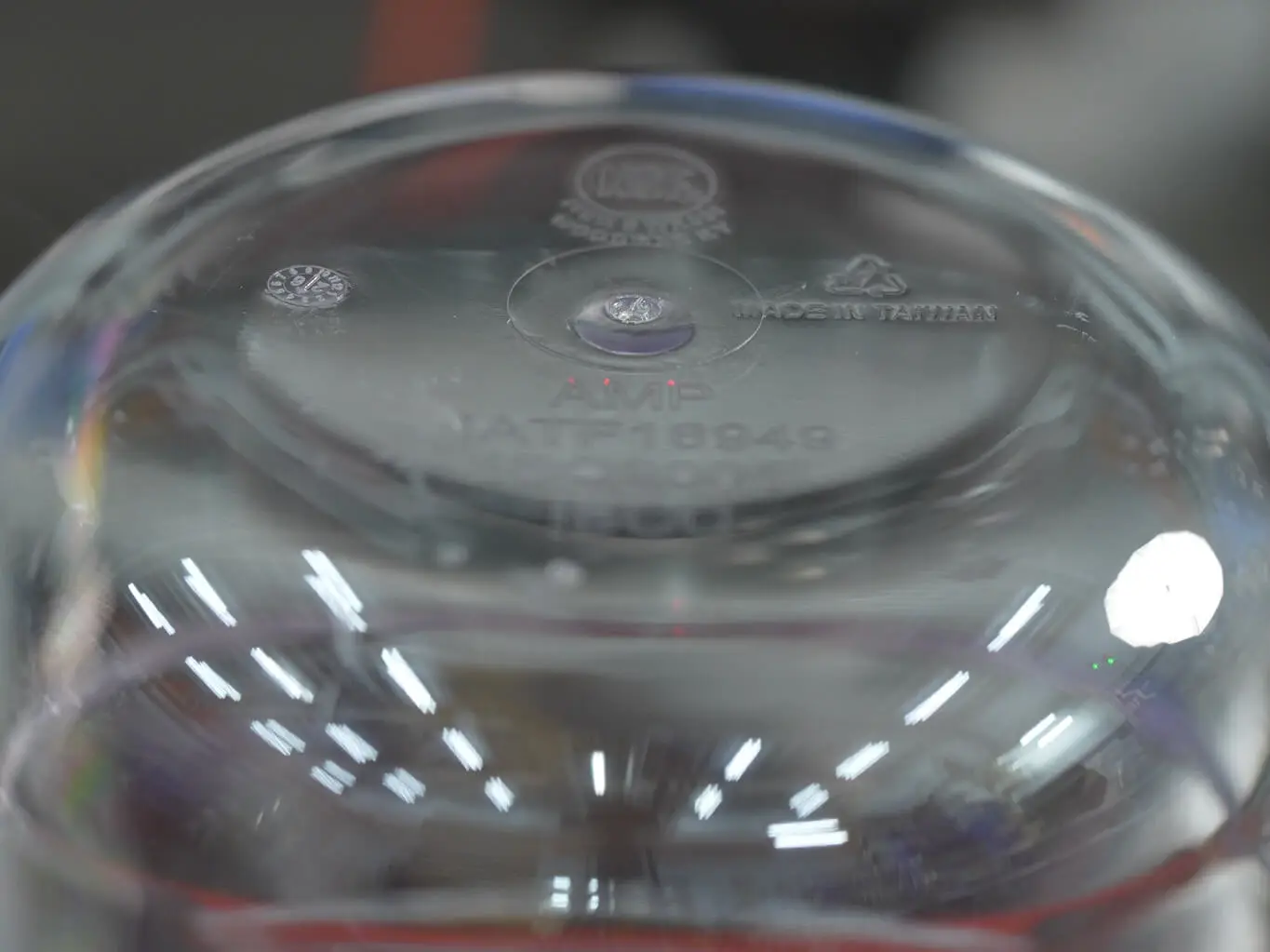 AMP laser engraving certification marks, branding, and traceability text directly onto injection-molded components as part of our in-house finishing process