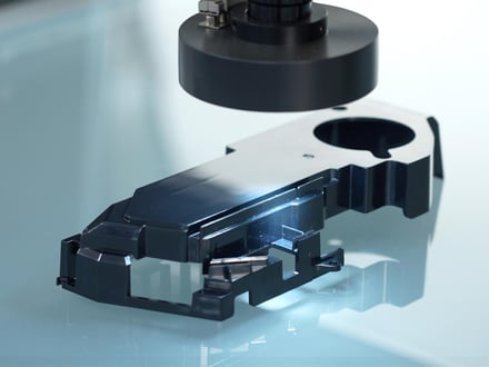 A finished part positioned under the 2.5D lens, measured automatically in the programmed sequence of measurement points