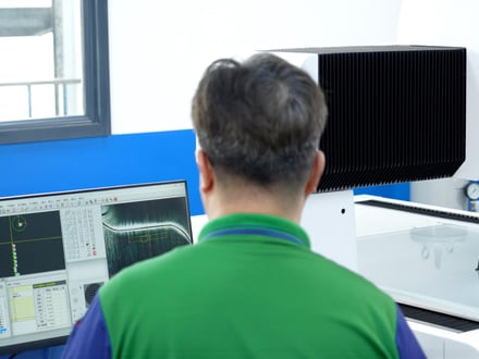 AMP quality staff using inspection equipment to set measurement positions and save the program to the computer for repeatable dimensional checks