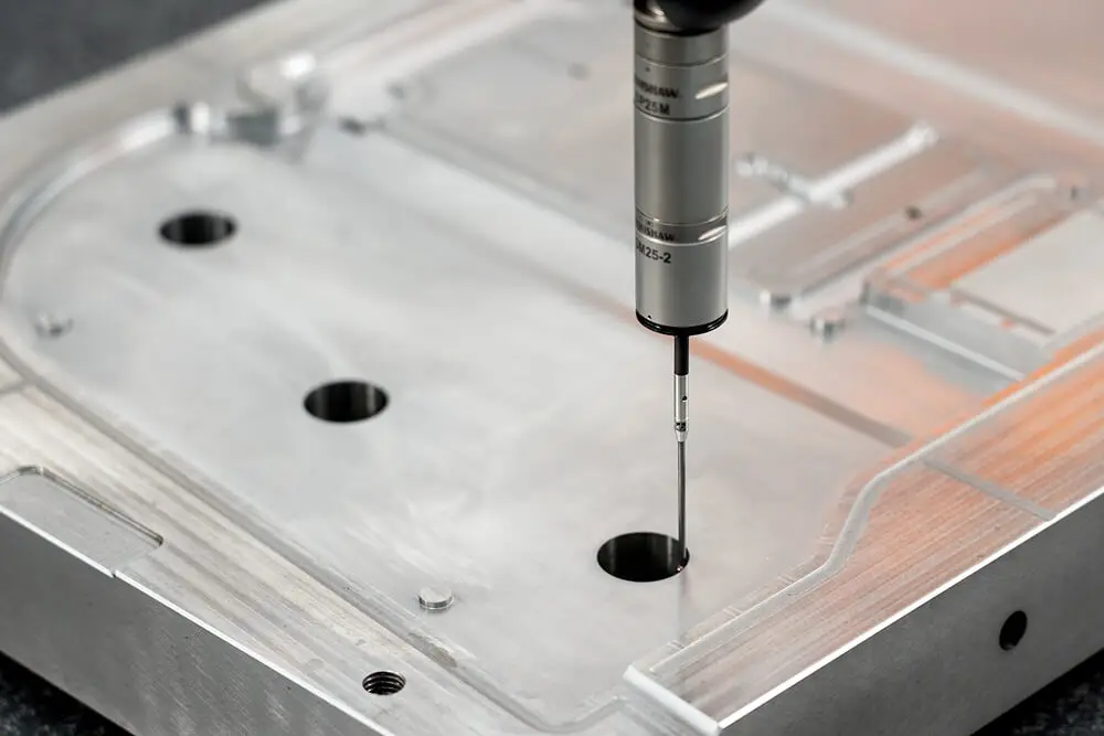 AMP verifies every machined mold component on our Renishaw-equipped CMM, confirming critical dimensions against 3D design data before mold assembly